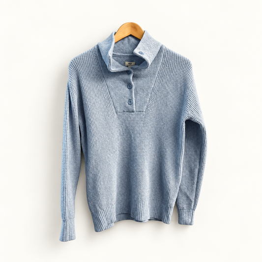 Aerie blue waffle knit mock neck sweater on off white editorial background