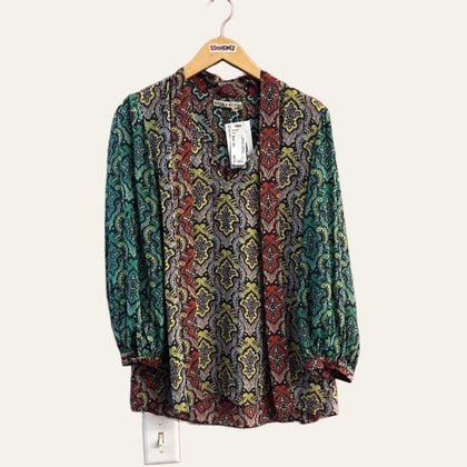 Alice + Olivia multicolor paisley top on warm off white editorial background