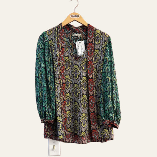 Alice + Olivia multicolor paisley top on warm off white editorial background