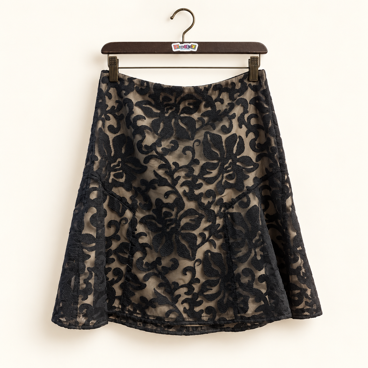 ann taylor flocked skirt on off-white background