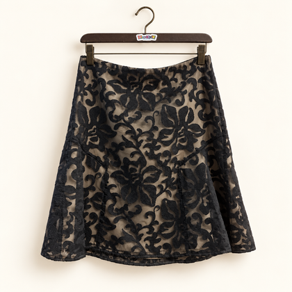 ann taylor flocked skirt on off-white background