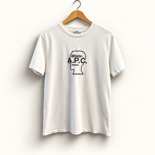 A P C and Brain Dead white and black tee on off white editorial background