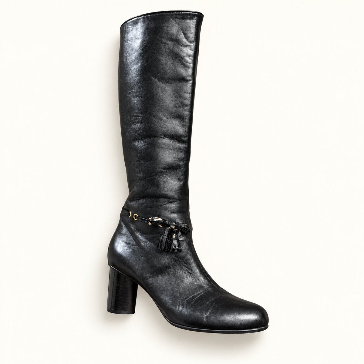 Bally Switzerland black leather boot on off white editorial background