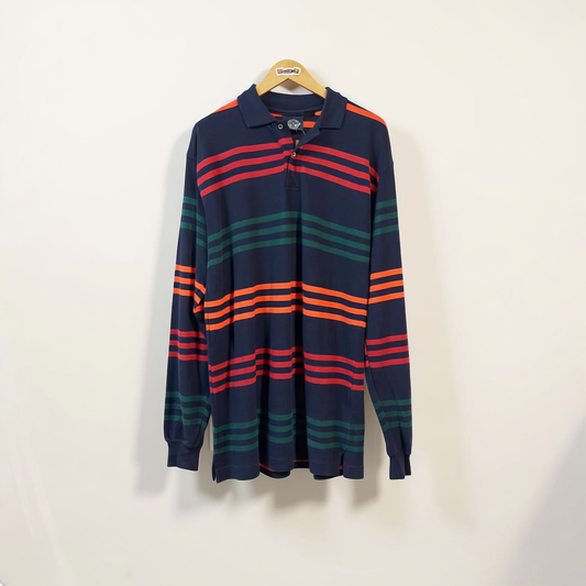 Dockers striped knit long sleeve polo on off white editorial background