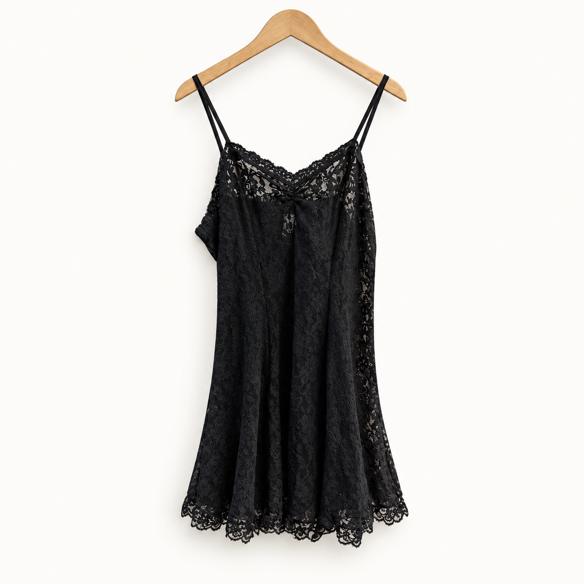 Hanky Panky black lace mini dress on off white editorial background
