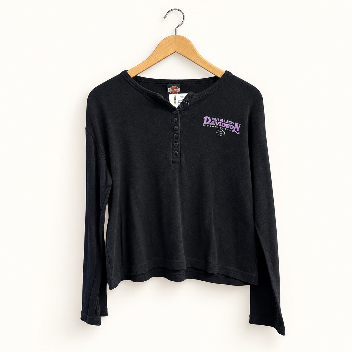 Harley Davidson long sleeve Henley on off-white editorial background