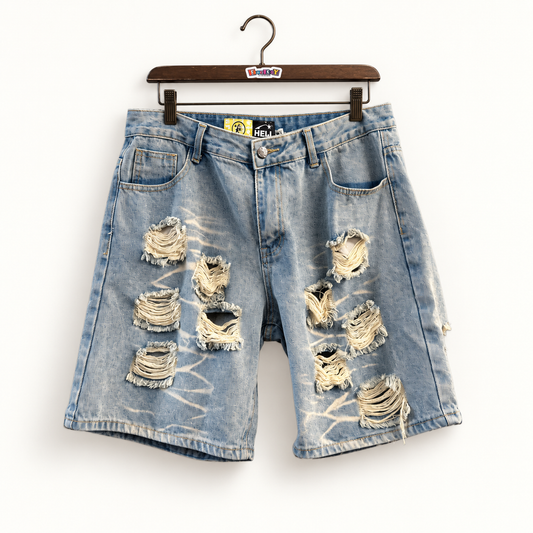 Hellstar distressed blue denim shorts on off white editorial background