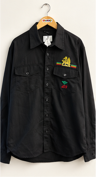 Lion of Judah embroidered black button up on warm off white editorial background