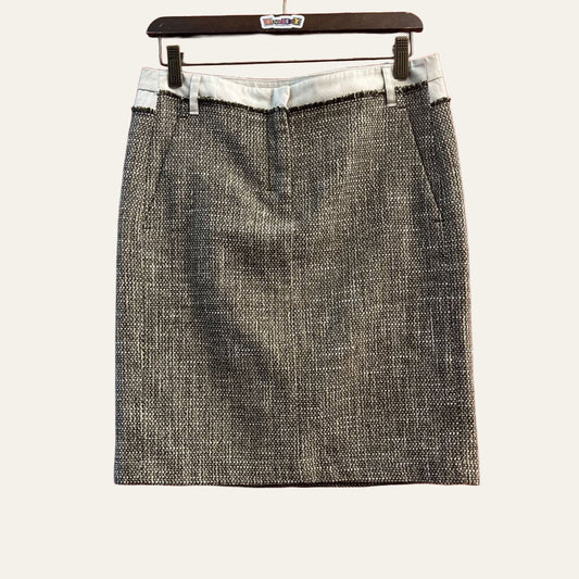 Max Mara patterned skirt on warm off white editorial background