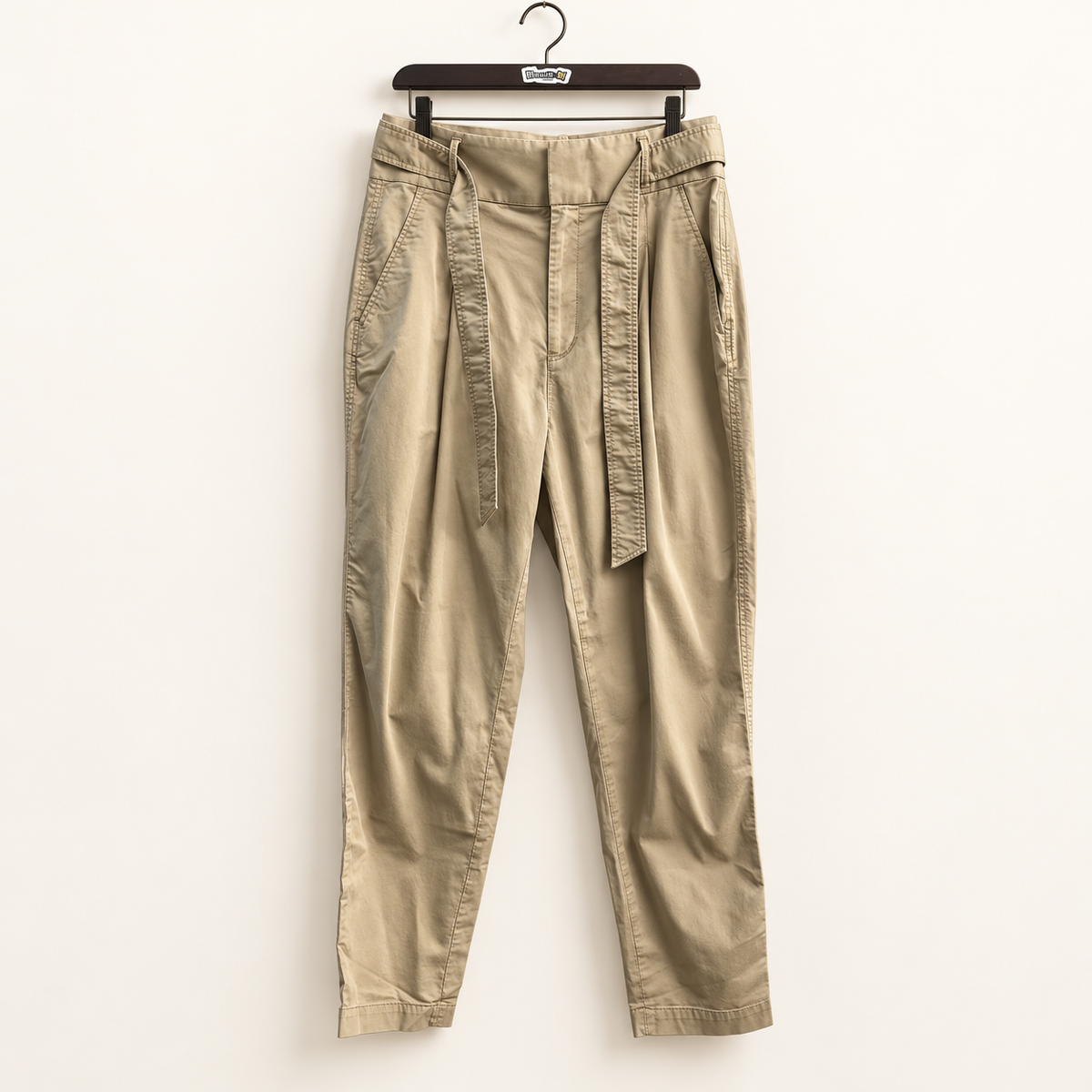 Polo Ralph Lauren brown chino pants centered on off-white editorial background
