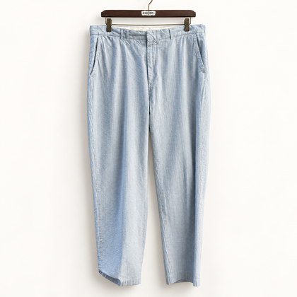 Polo Ralph Lauren blue and white seersucker trousers on off white background