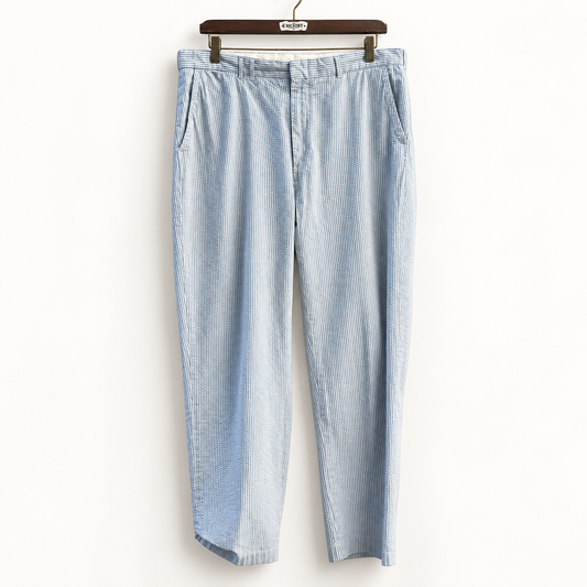 Polo Ralph Lauren blue and white seersucker trousers on off white background