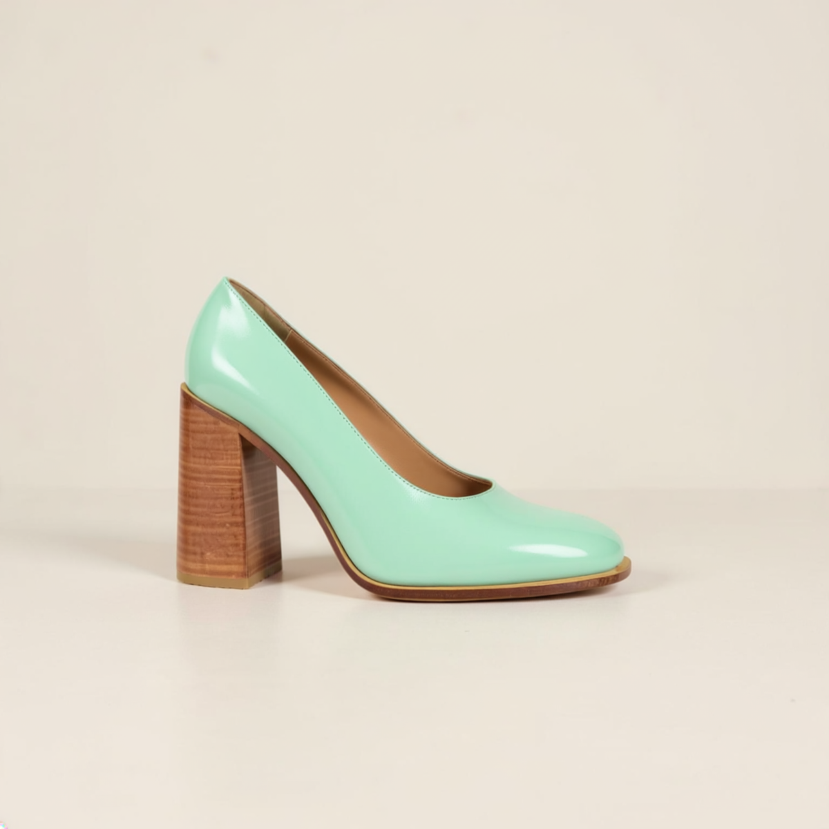 Rachel Comey Aqua Blue Pumps on off-white editorial background