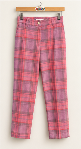 Selva Negra pink and mauve plaid pants on warm off white editorial background