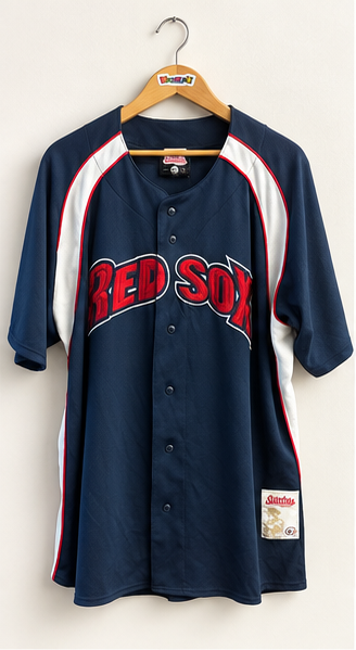 Stitches vintage Red Sox baseball jersey on warm off white editorial background
