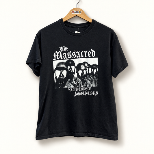 The Massacred black graphic tee on off white editorial background