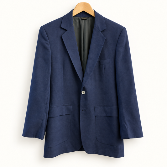Vintage blue raw silk sport coat on off white background