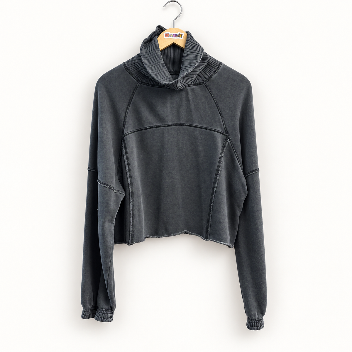 We the Free grey long sleeve top on off white editorial background
