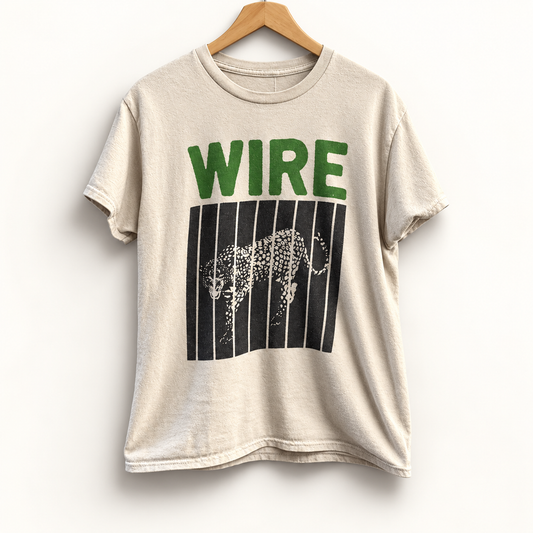 Wire vintage cheetah graphic tee on off white editorial background